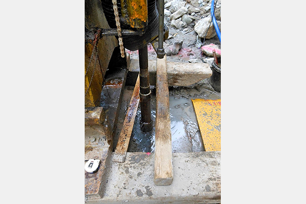 Core-drilling of large diameter bored piles