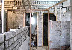 Erection of new non-structural partition walls, installation of new toilets and kitchens